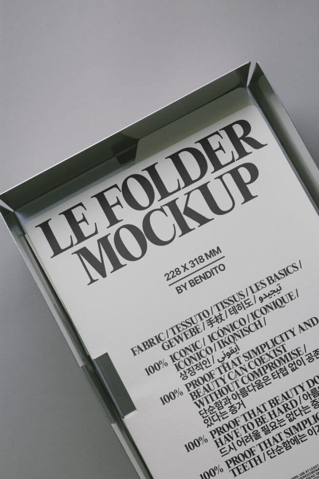 Angled view of folded letter mockup with white paper inside olive green box