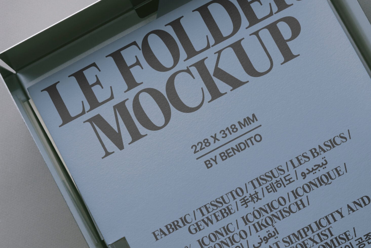 Close-up of letter mockup showing blue tinted paper with serif typography details