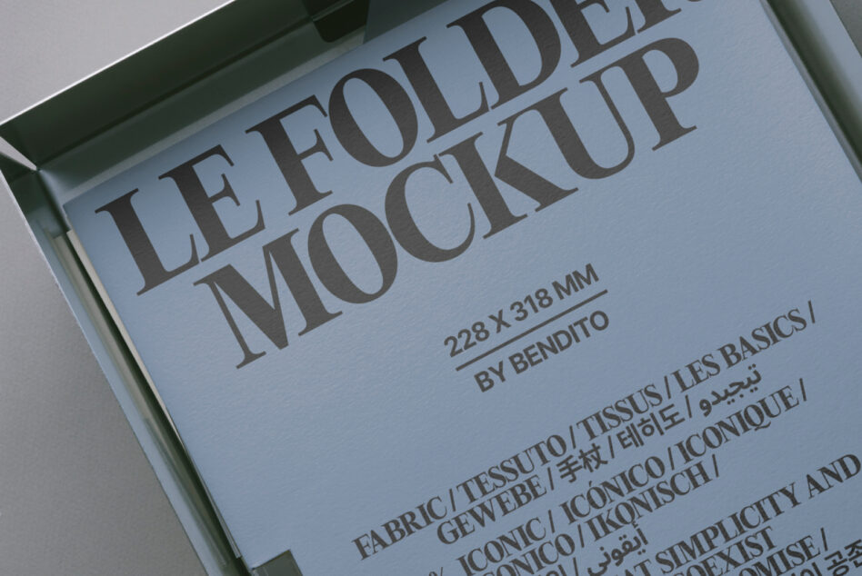 Close-up of letter mockup showing blue tinted paper with serif typography details