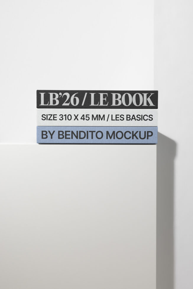 Stacked book spines mockup, white background, charcoal, white, blue bands