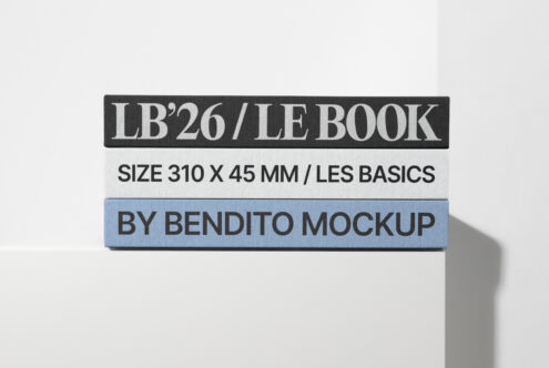 Stacked book spines mockup on white, periwinkle blue accent band, shadow