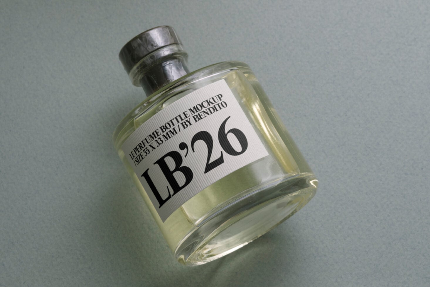 Perfume bottle featuring white label mockup displayed at angle