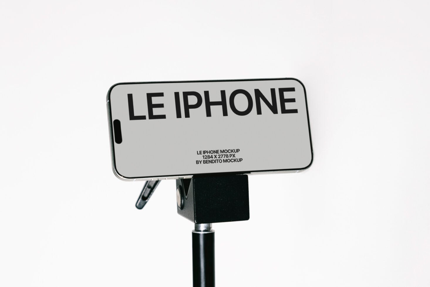 Light gray iPhone on mounted display stand against white