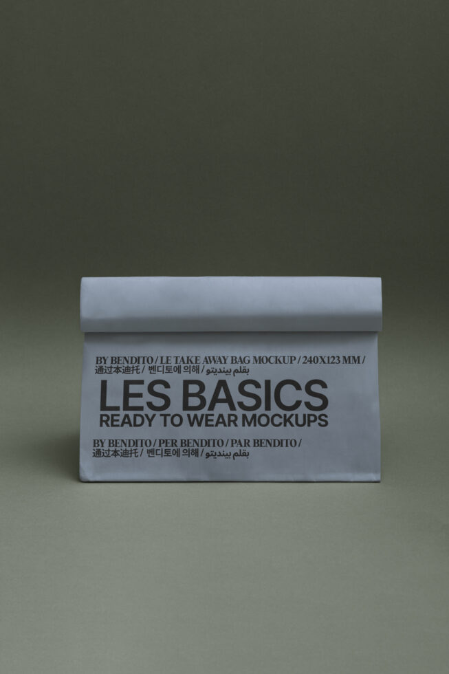 Rolled white paper bag mockup with Les Basics Ready to Wear branding on sage background