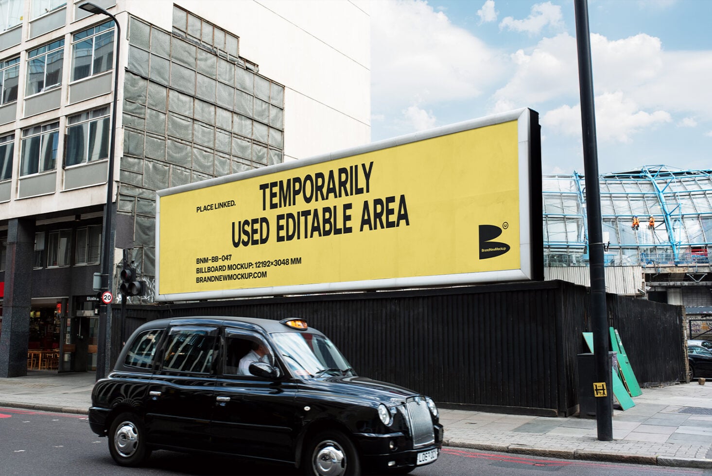 Large outdoor billboard mockup with yellow background on street