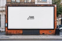 Street billboard mockup with white background on weathered metal storefront