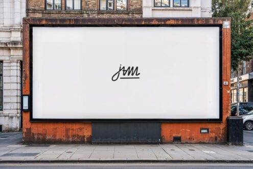 Street billboard mockup with white background on weathered metal storefront