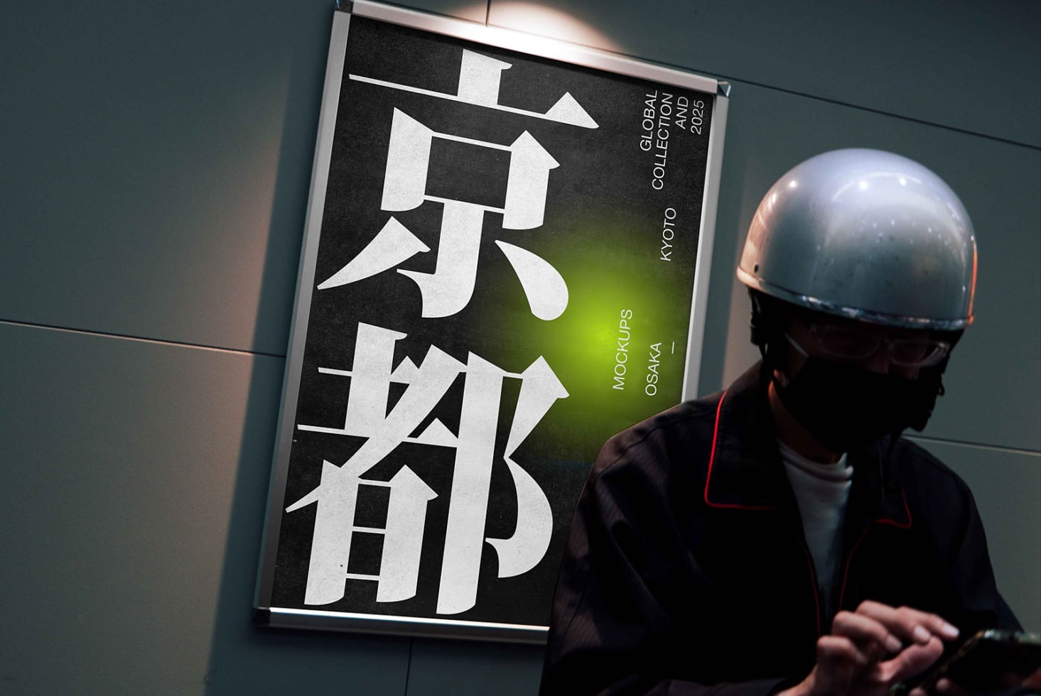Person in helmet examining framed poster featuring large kanji typography, lime green gradient