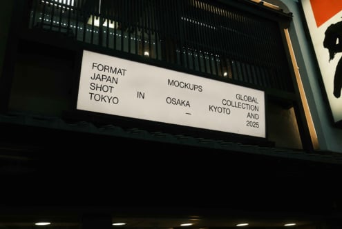 Horizontal backlit signage with minimalist typography, warm gold accent, dark architectural setting