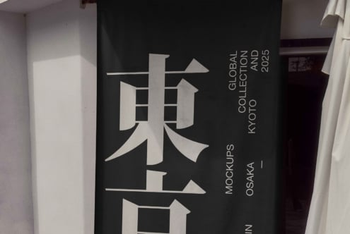 Dark cylindrical banner mockup with white Japanese typography, Osaka location