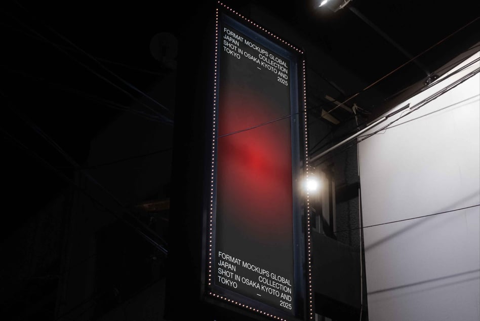 Vertical lit billboard at night with red gradient design