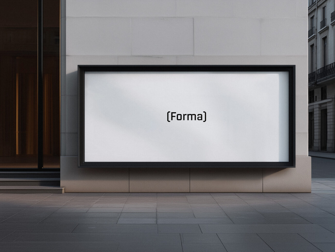 Black framed billboard on urban wall showing blank white screen
