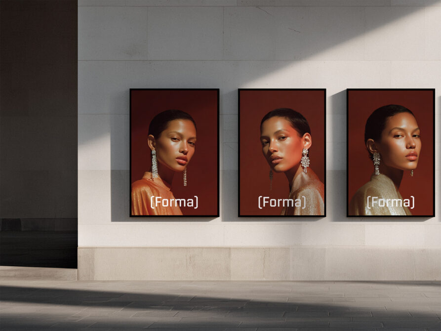 Three framed portrait photos on gallery wall with warm burgundy backgrounds