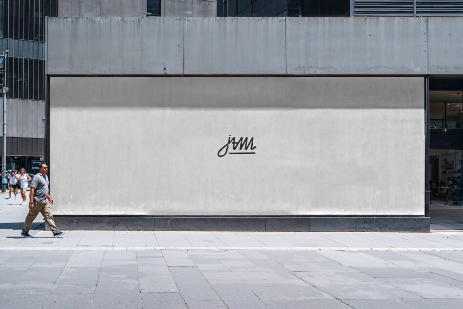 Blank outdoor billboard mockup on urban street with concrete facade