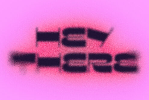 Two rows of text with pixelated blur effect on bright magenta background