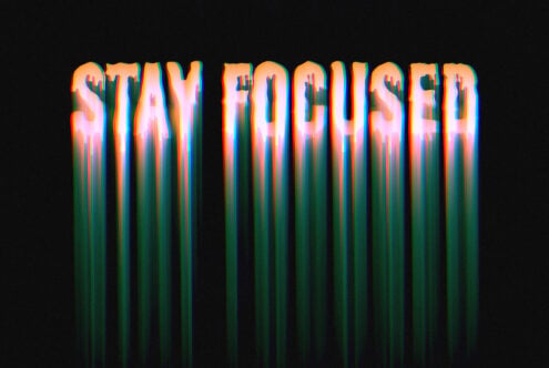 Stay Focused text featuring neon orange to teal gradient with vertical light streaks