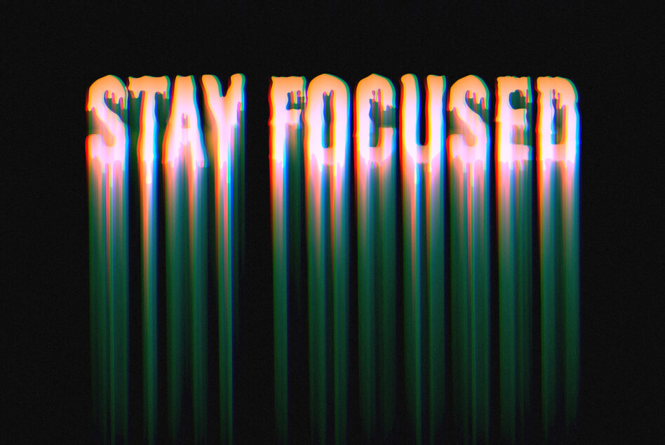 Stay Focused text featuring neon orange to teal gradient with vertical light streaks