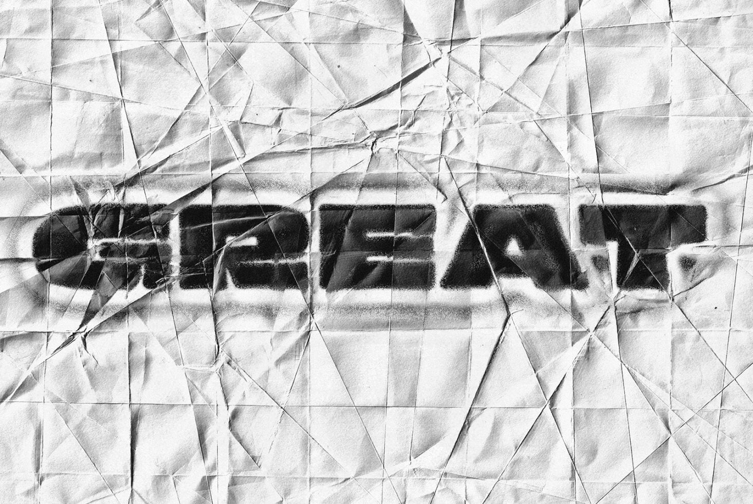Crumpled paper texture overlay with black text effect
