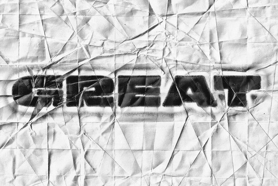 Crumpled paper texture overlay with black text effect
