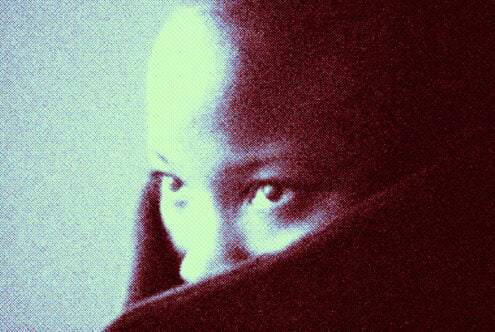 Close-up side profile face with cyan yellow magenta halftone separation