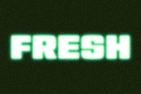 Bright neon green glowing text on dark textured background