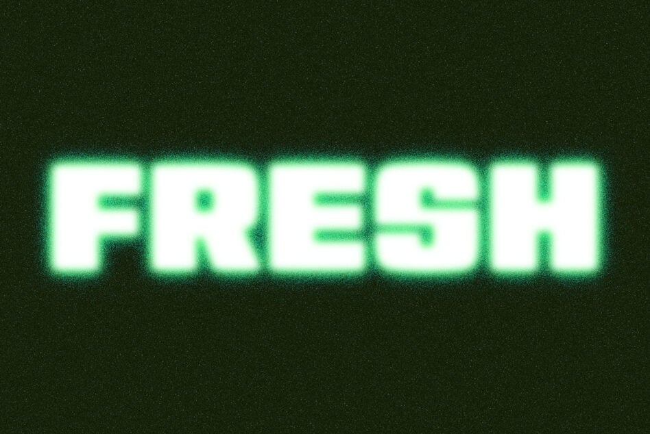 Bright neon green glowing text on dark textured background