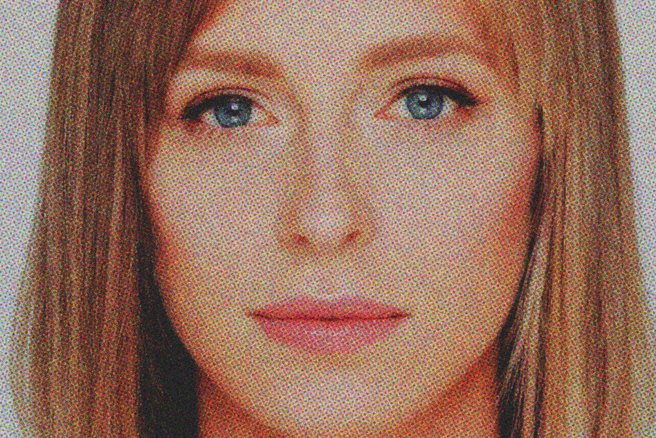 Face rendered entirely in multicolored dotted halftone texture style