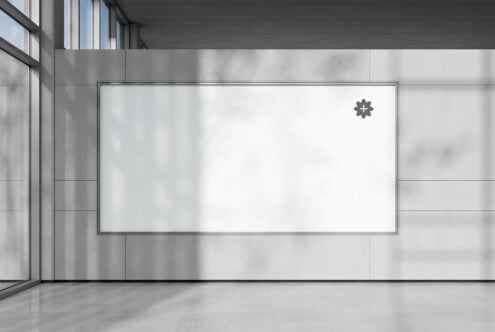 Wide horizontal billboard mockup in modern office space with windows