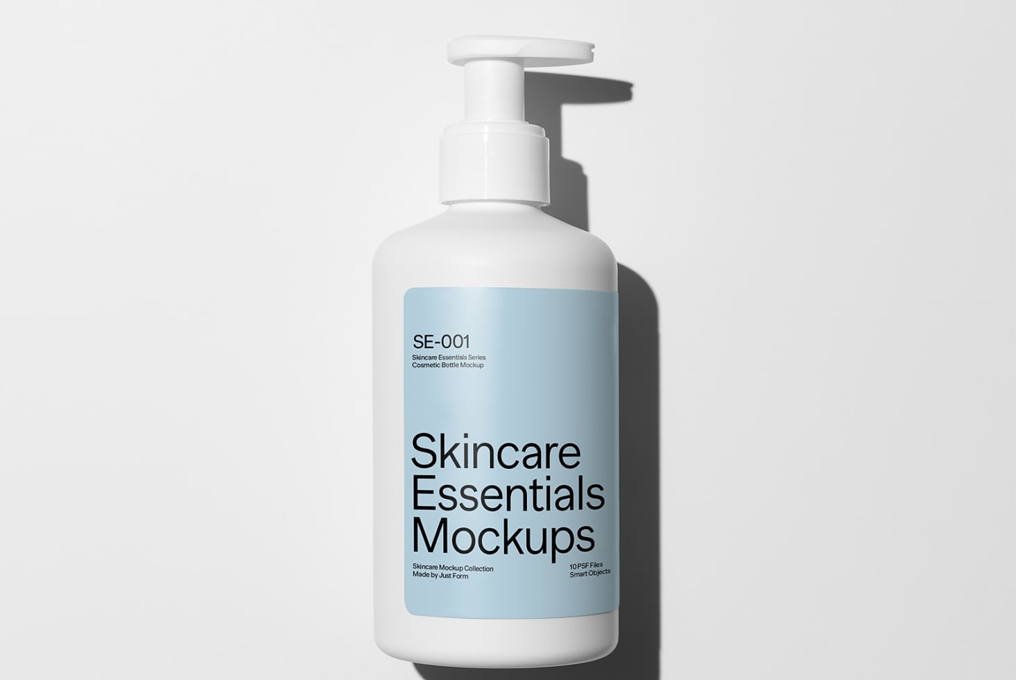 Stacked skincare bottles including pumps, sprays, droppers with mockup labels