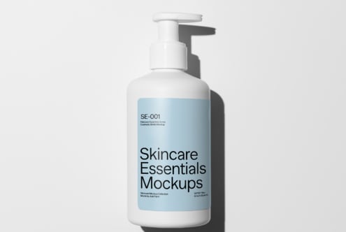 Stacked skincare bottles including pumps, sprays, droppers with mockup labels