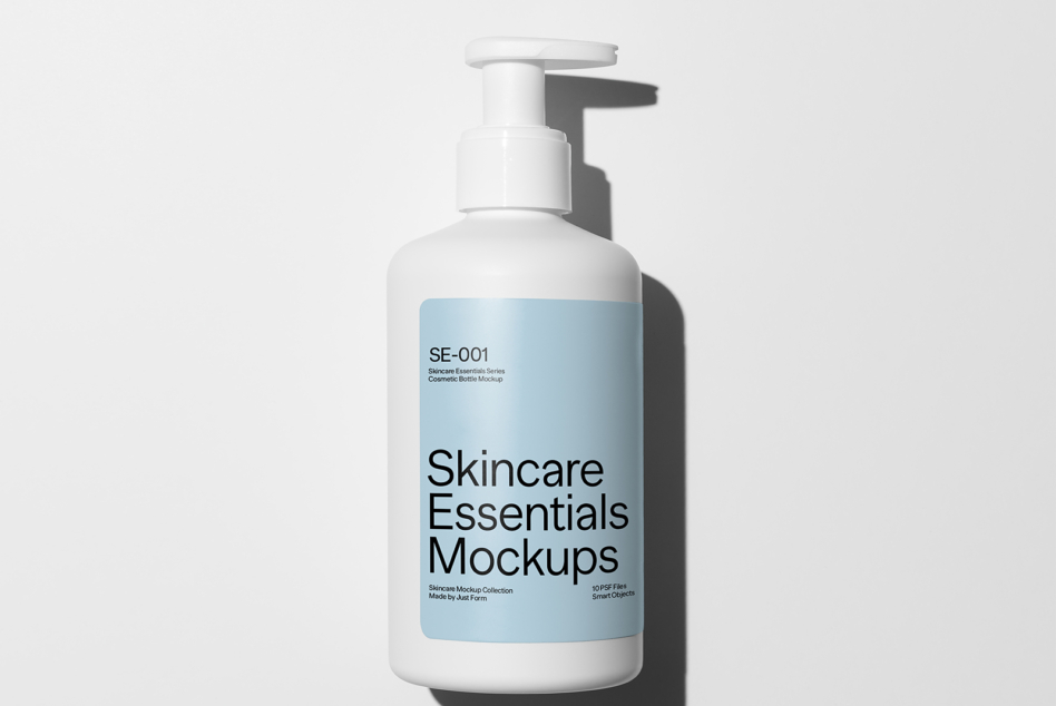 Stacked skincare bottles including pumps, sprays, droppers with mockup labels