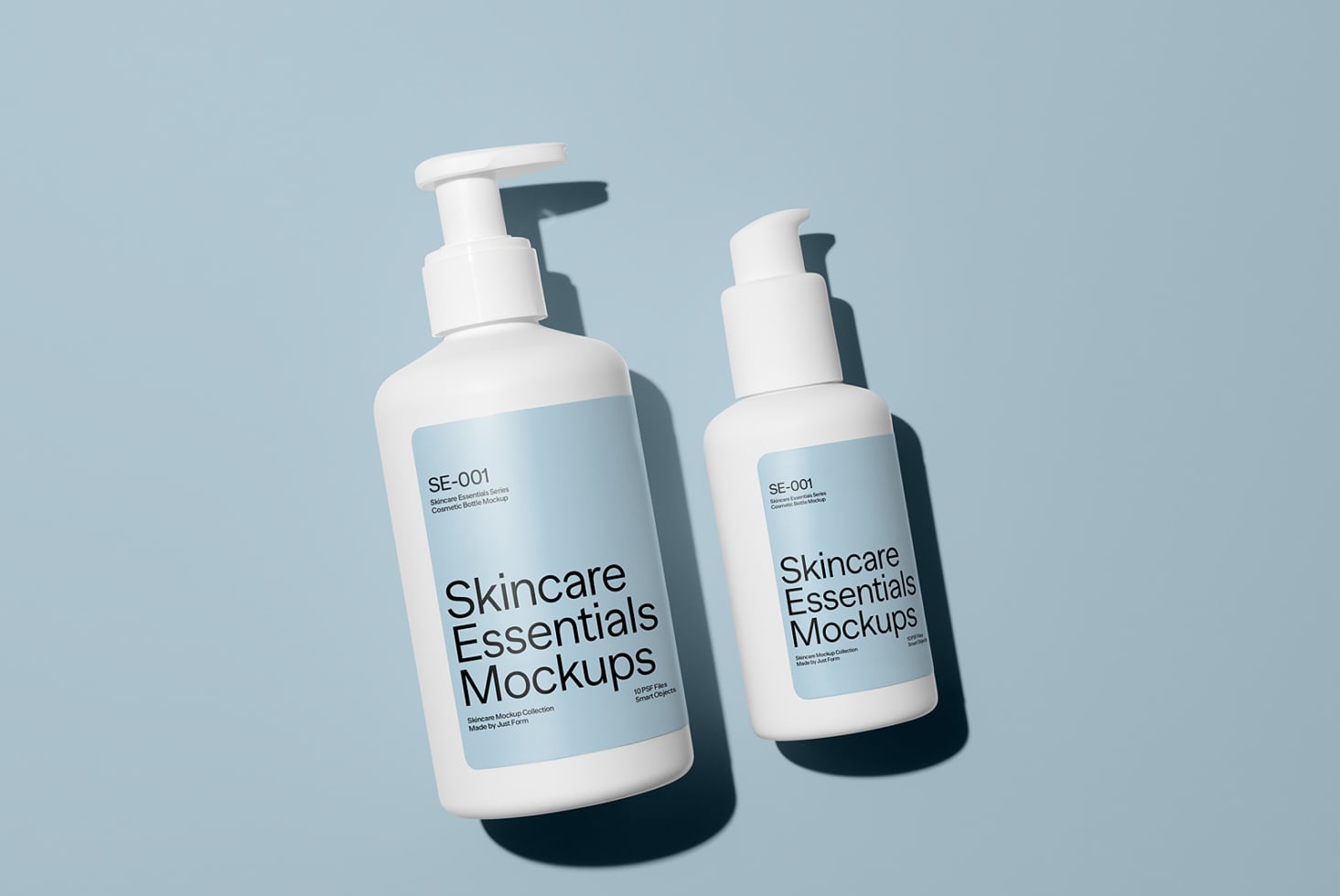 Two pump bottles with shadows on soft blue background