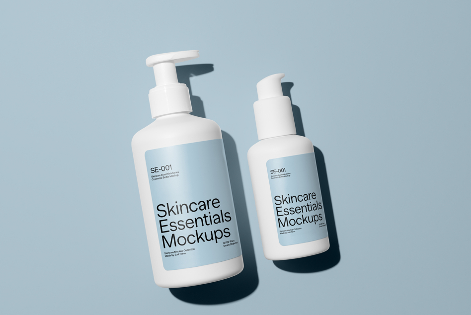 Two pump bottles with shadows on soft blue background