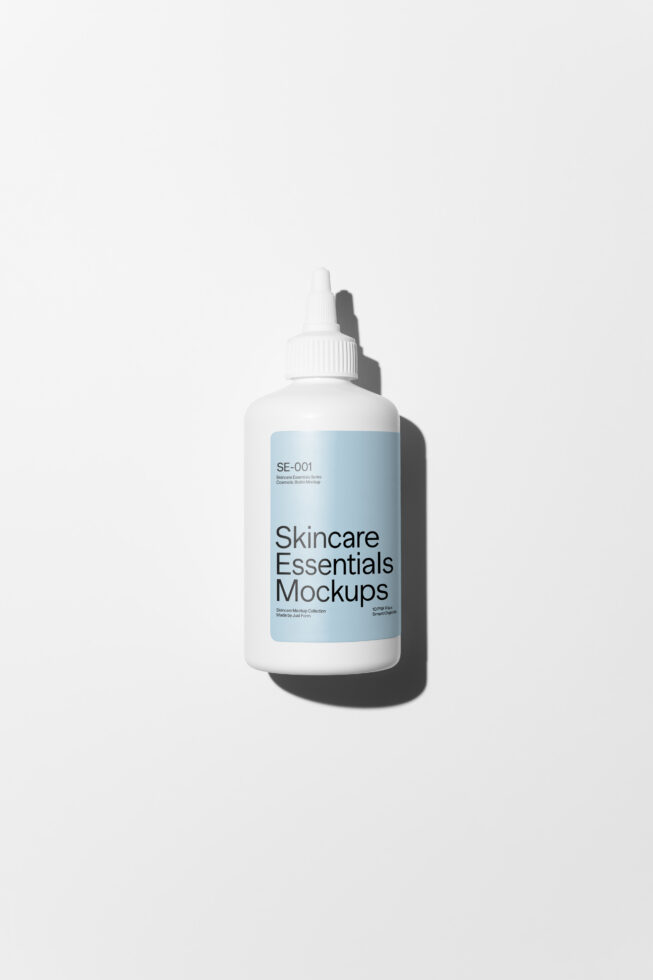 White dropper bottle with blue label on clean background