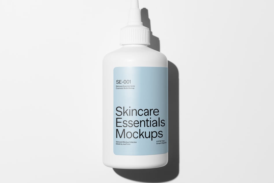 White pump bottle with blue label against neutral background
