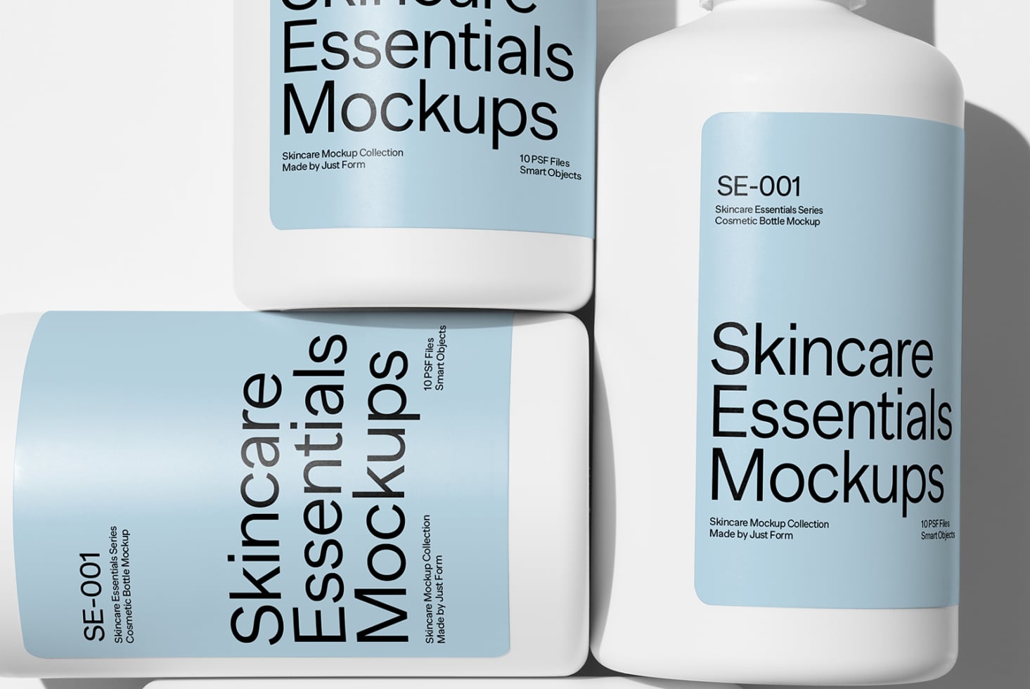Skincare bottle mockups in white with blue label details on minimal background