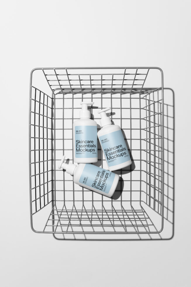 Skincare bottles with pump dispensers inside shopping cart mockup, overhead view
