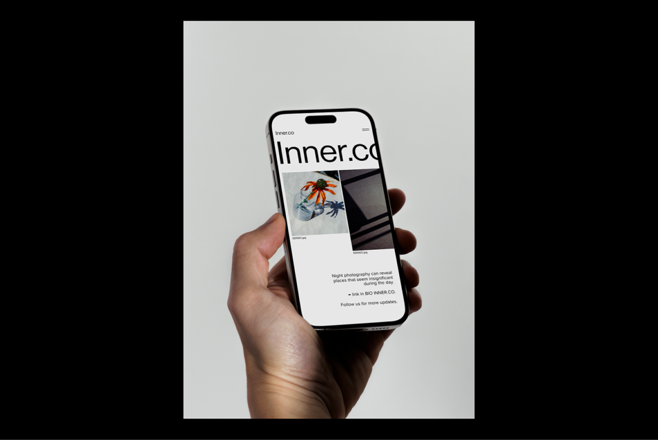Hand holding smartphone displaying a website. Modern mobile mockup for digital assets, web design, UI, UX, and responsive design templates.