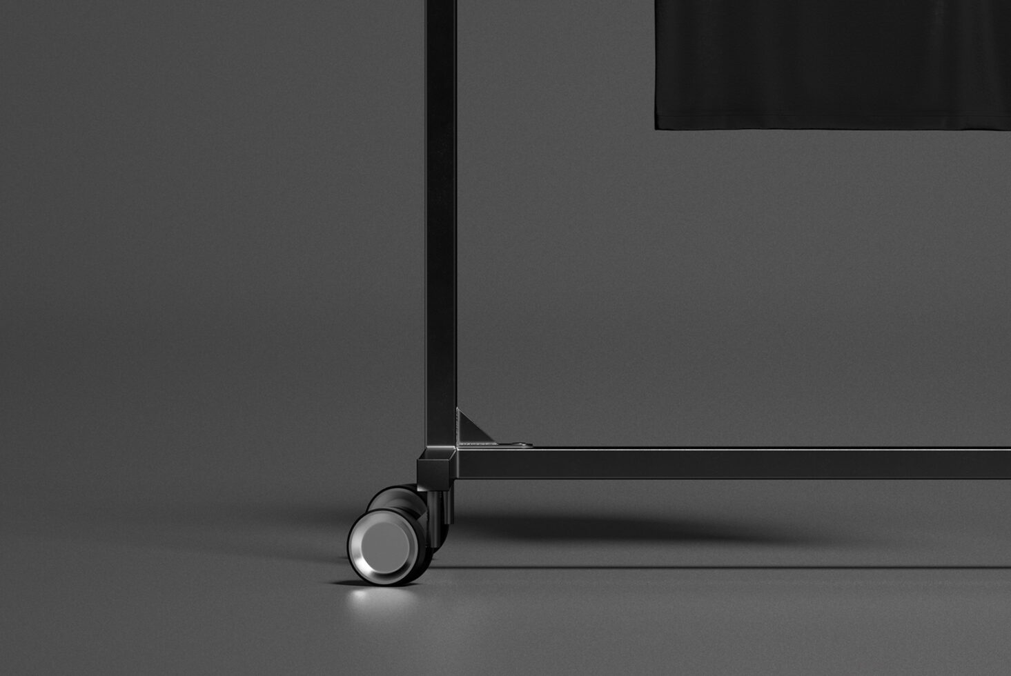 Close up of rolling rack base with caster wheels