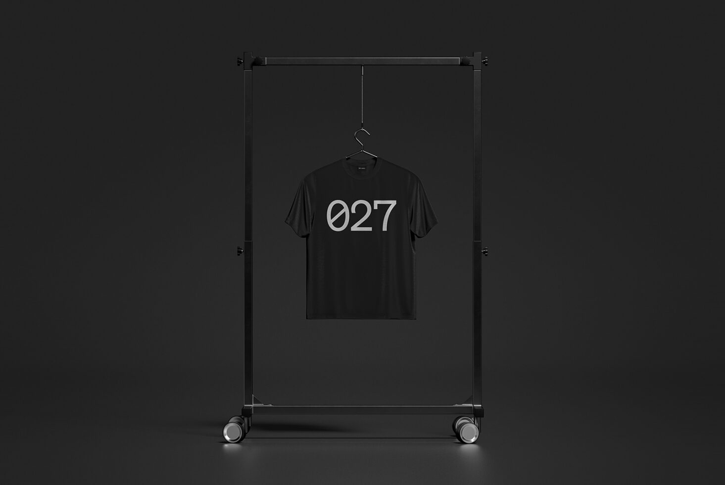 Black shirt with 027 printed on metal clothing rack