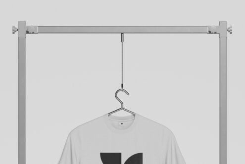 Oversized clothing rack with adjustable height rod display setup