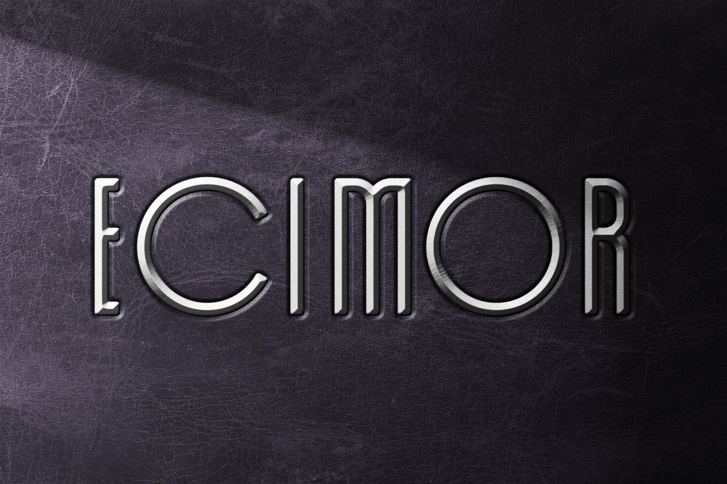 Silver metallic text reading ICIMOR on dark textured background with embossed effect