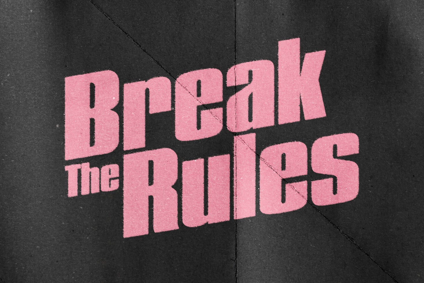 Pink bold text Break The Rules on dark gray split background
