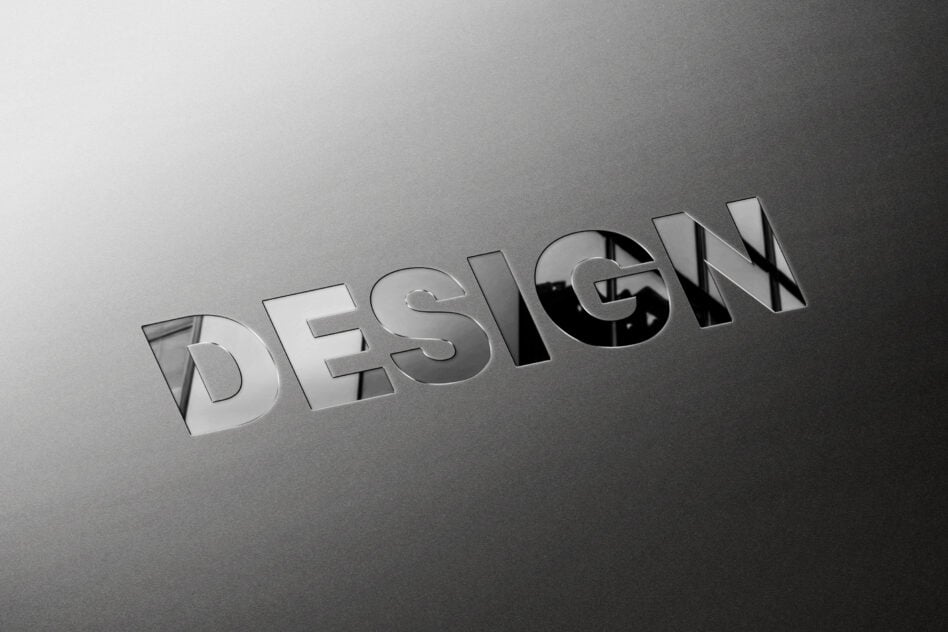 DESIGN text in metallic 3D effect on gray gradient background