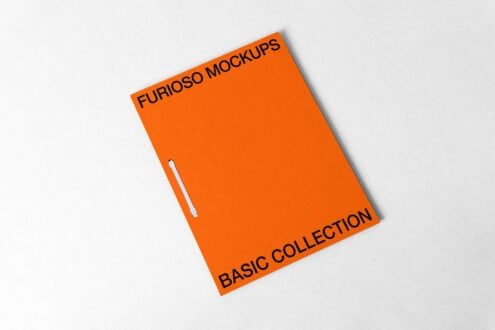 Orange spiral-bound booklet on white background with shadow