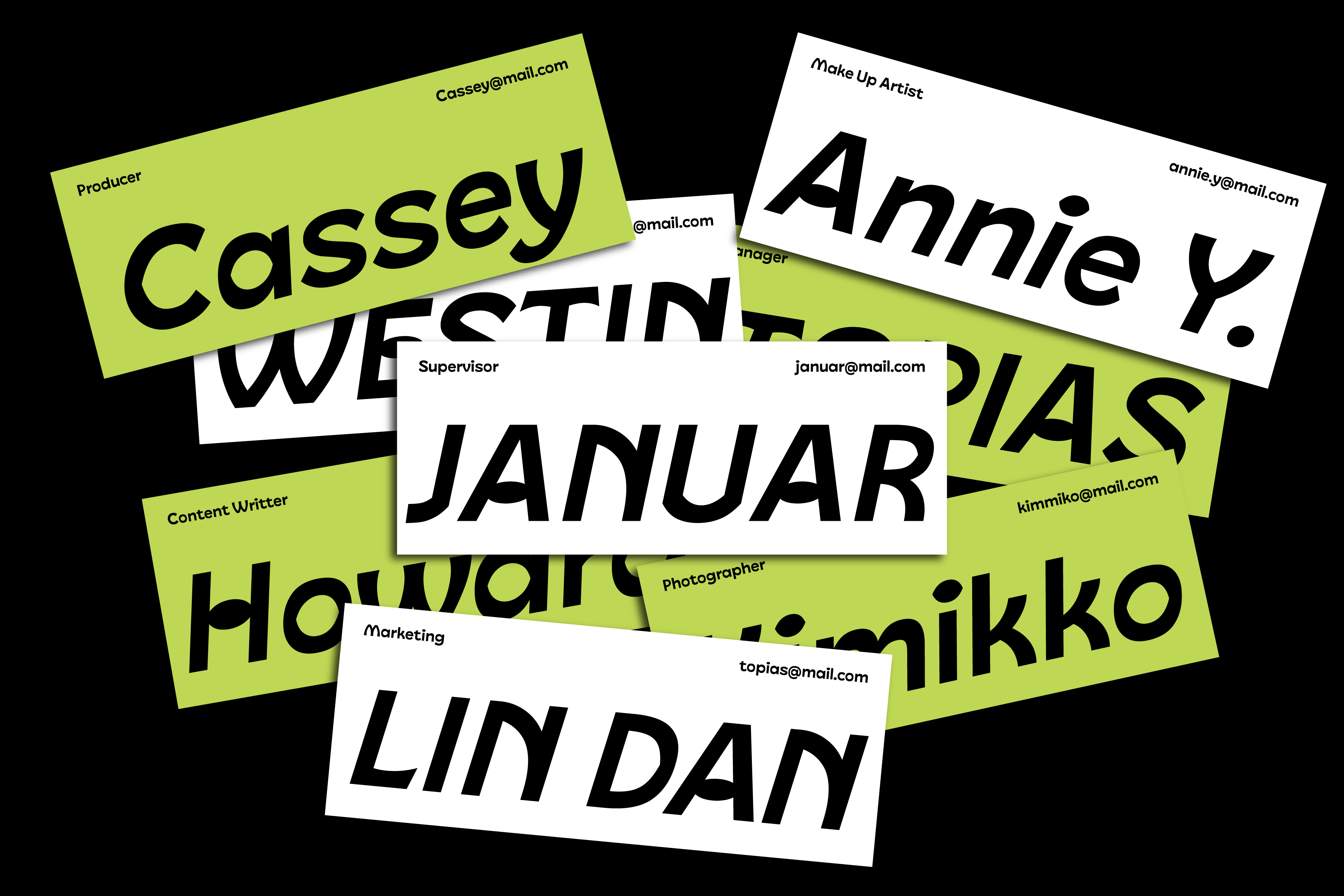 Overlapping business cards in lime with names, roles, emails scattered