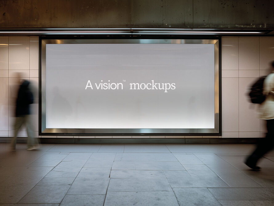 Horizontal billboard in transit hub showing light gray background with white text