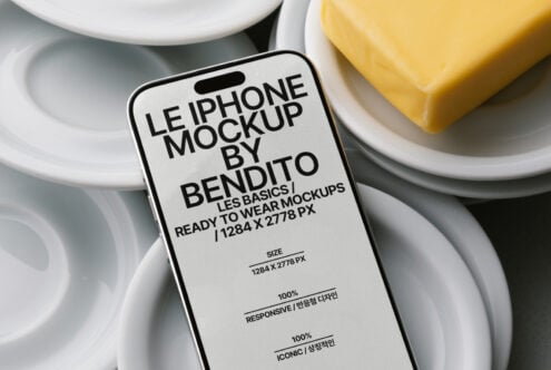 Light iPhone mockup centered on white plate with butter bar nearby