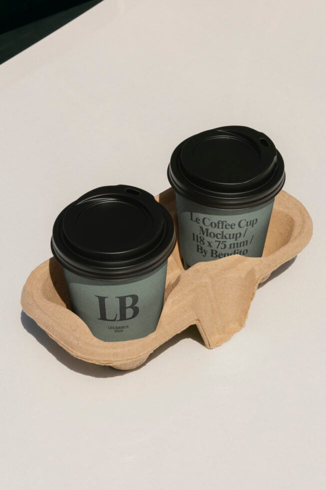 Two paper coffee cups in cardboard carrier with LB branding mockup