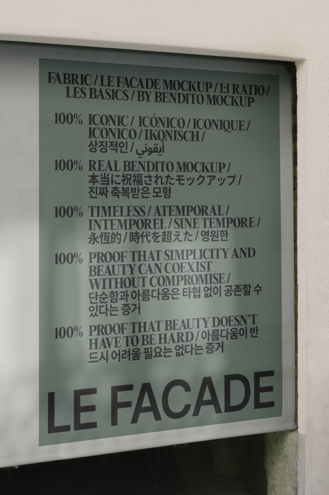 Fabric wall sign with multilingual text about Le Facade mockup on teal background
